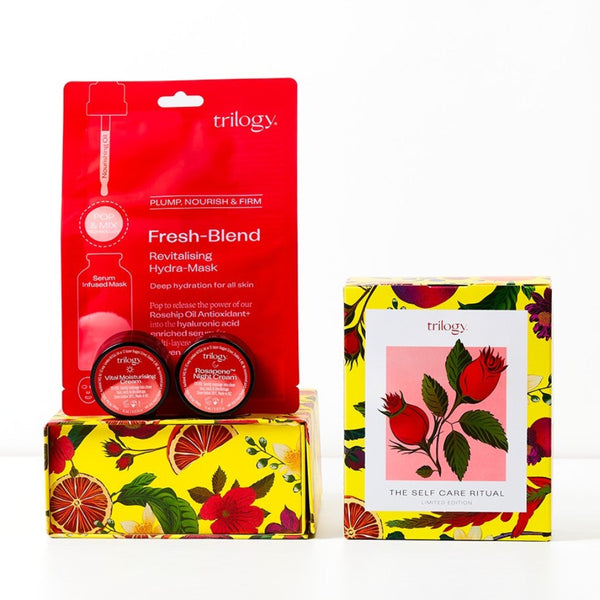 Set of skincare products with colorful packaging on a white background