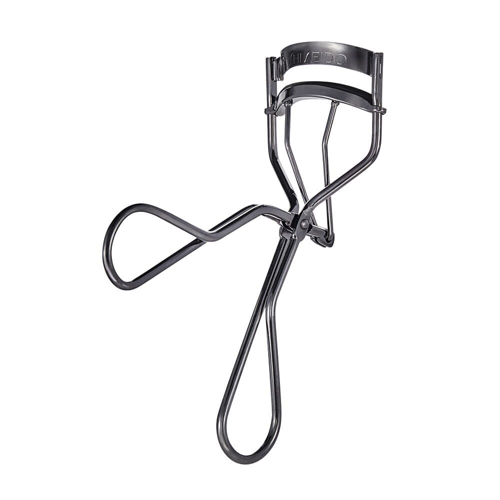 Eyelash curler on a white background
