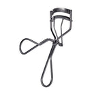 Eyelash curler on a white background