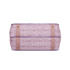 Bottom of bag. Purple patterned bag with gold accents on a white background
