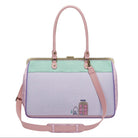 Handbag with pink handle and strap on a white background