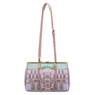 Handbag with architectural design and pink strap on a white background