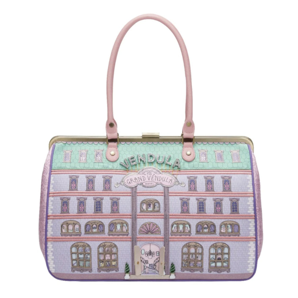 Handbag with building design and 'Vendula' branding on a white background