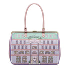 Handbag with building design and 'Vendula' branding on a white background