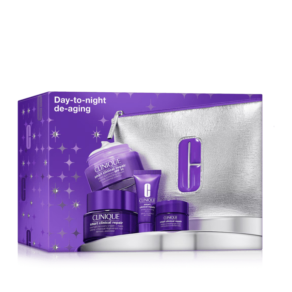 Clinique skincare set with purple packaging on a white background