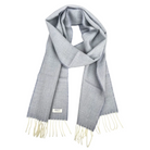 A light gray woven scarf with cream fringe ends and a small white brand label, displayed against a solid white background.