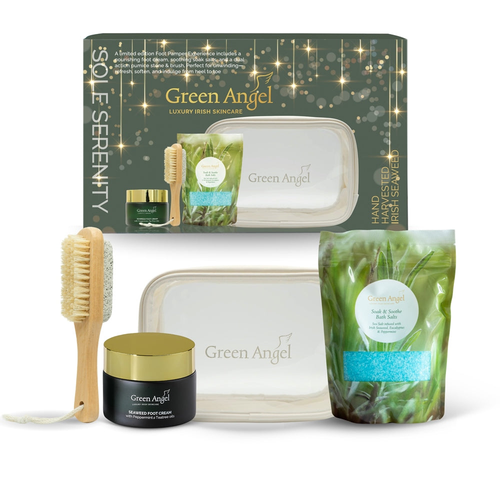 Green Angel skincare product set including cream, scrub, and brush on a white background