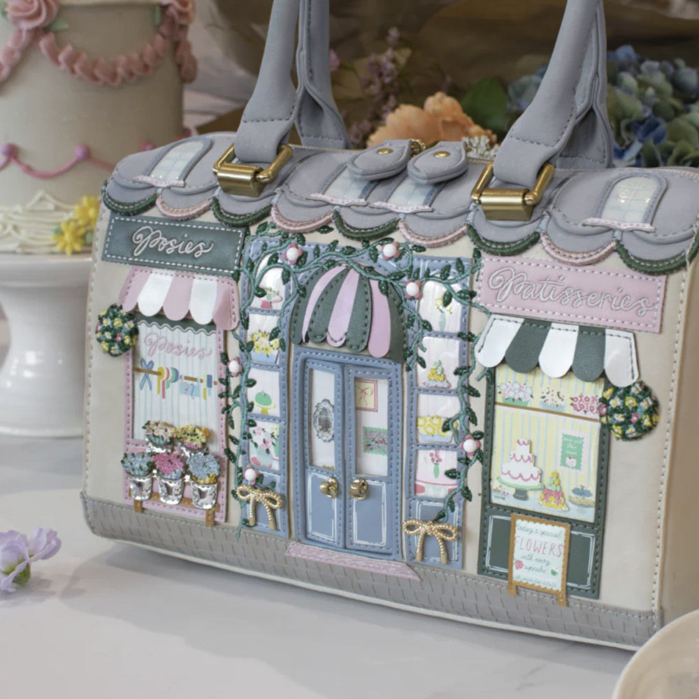 Decorative handbag with a detailed facade design on a light background