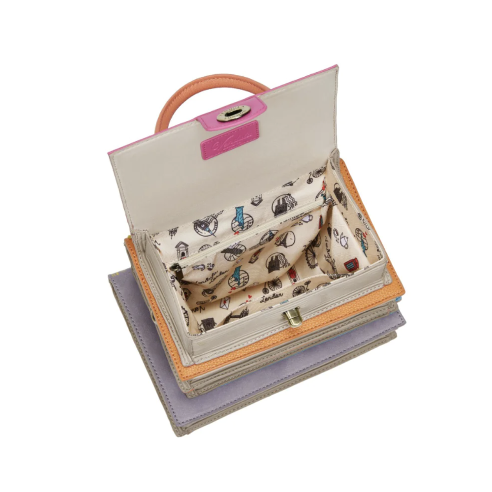 Foldable handbag with patterned interior on a white background
