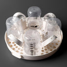Bottle drying rack with baby bottles on a dark background