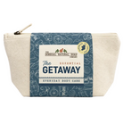 A canvas body care pouch by The Donegal Natural Soap Company, featuring a cream-colored body, a blue patterned wrap, and a central white label that reads 'The Getaway Everyday Body Care'.