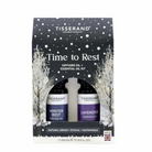 Tisserand Aromatherapy 'Time to Rest' diffuser oil and essential oil kit in a black gift box with white snowflake and tree illustrations, containing Winter Rest and Lavender bottles.