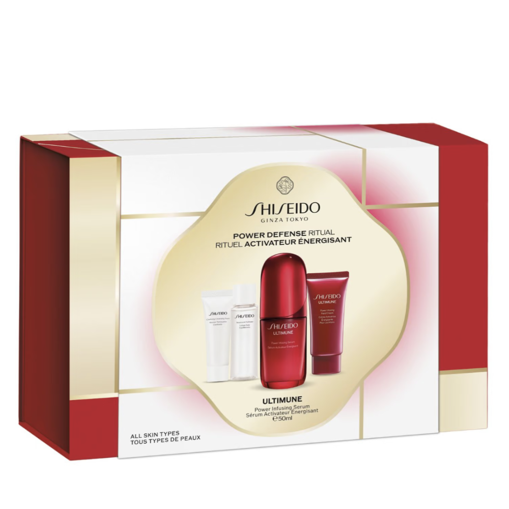 Shiseido Ultimune Power Defense Ritual Kit in its original packaging, featuring a red and white box with gold accents and a central gold oval displaying the product bottles.