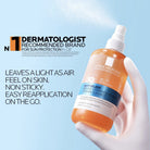 La Roche-Posay Anthelios sun mist bottle with promotional text on a light blue background