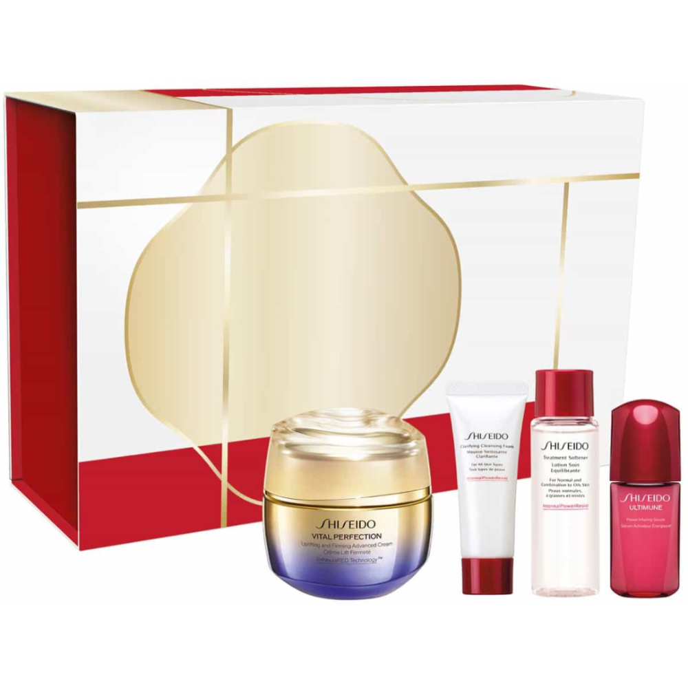 Shiseido skincare set with a large cream jar and smaller bottles on a white background