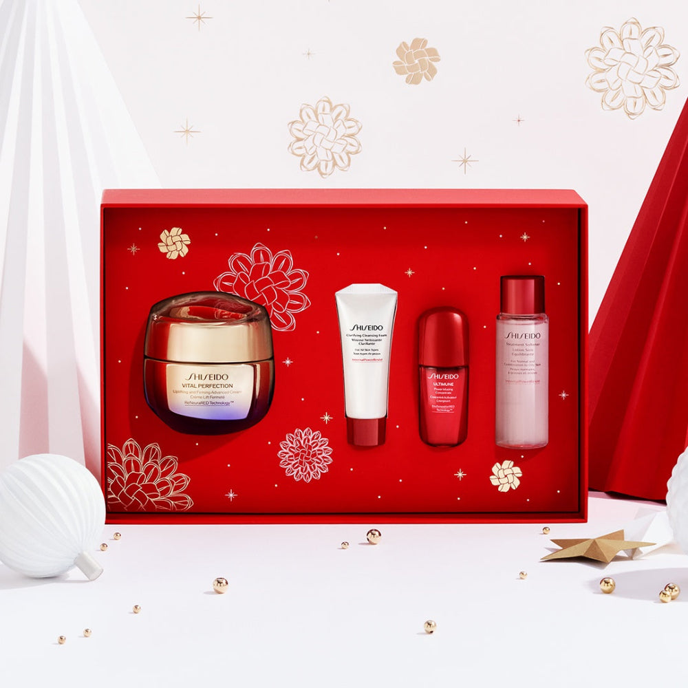 Shiseido skincare product set in a decorative red box with festive elements.