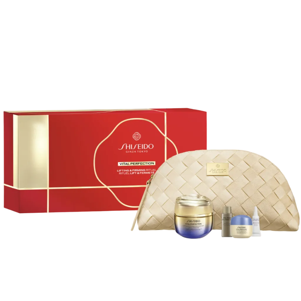Shiseido Vital Perfection gift set featuring a red and gold outer box, a woven beige pouch, a blue-and-gold cream jar, and two small sample vials on a white background.