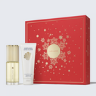Two Estée Lauder products, a bottle and a tube, on a light gray background.
