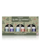 Tisserand 'Winter Wonderland' diffuser oils gift set in a decorative green box with Christmas tree illustrations, containing four essential oils: Calm & Sweet, Peace & Love, Winter Wonderland, and Green Mist.