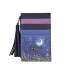A vertical card holder wallet with a tassel zipper pull, featuring a color-blocked design in navy blue, lavender, and dark purple, with a blue night-sky and London skyline illustration on the front. The brand name 'Vendula London' is printed on the front.
