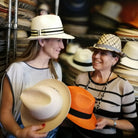 models wearing panama hats