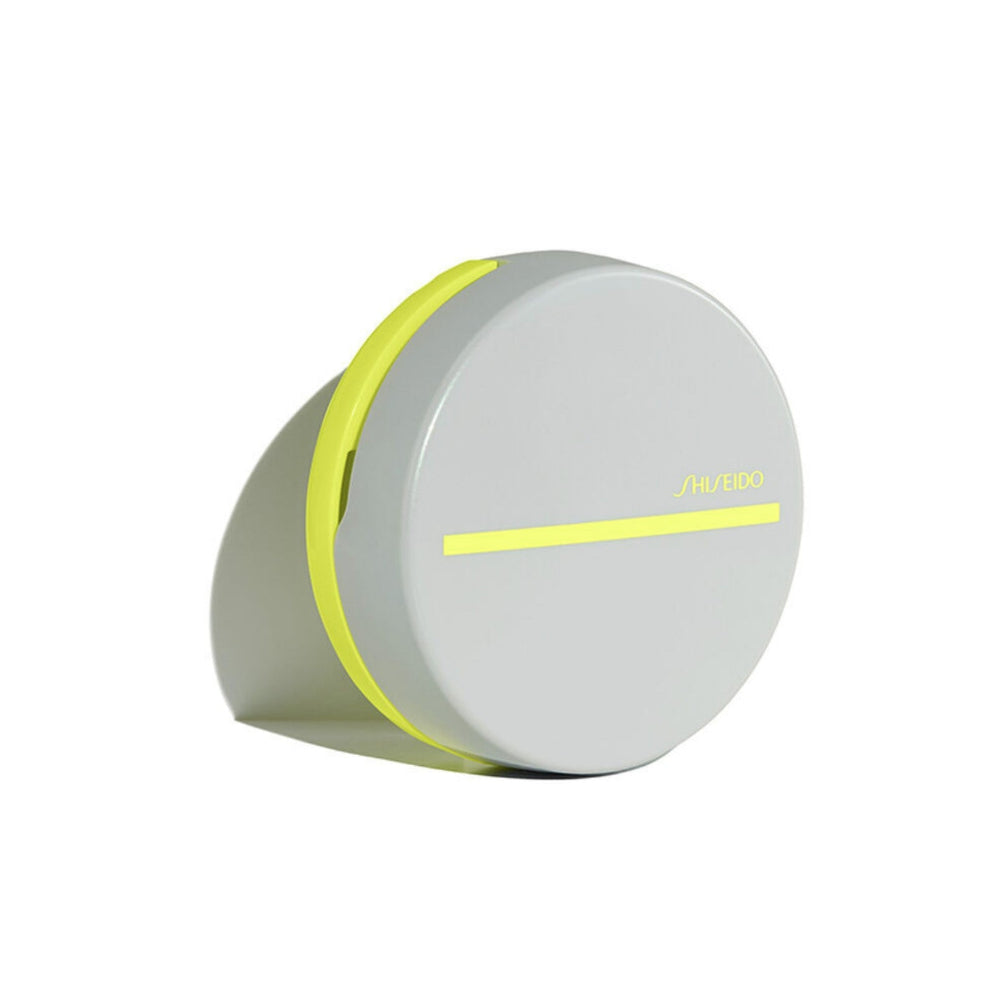 Round gray bb compact on a white background